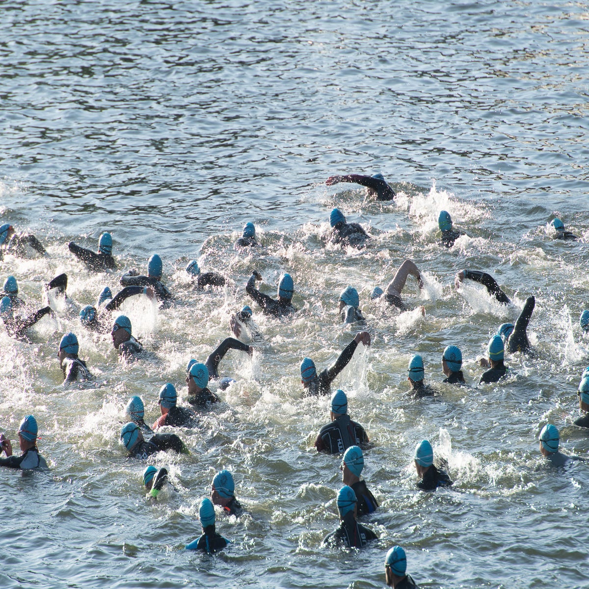 Dozens of triathletes left severely ill after swimming in River Thames |  The Independent