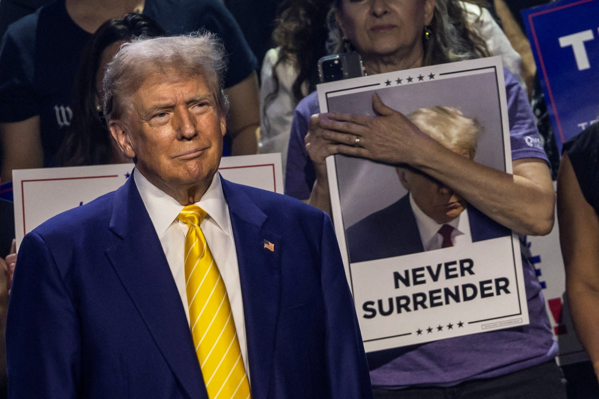 Trump looks on as he arrives to deliver a campaign speech during a Turning Point USA event at the Dream City Church in Phoenix, Arizona on June 6