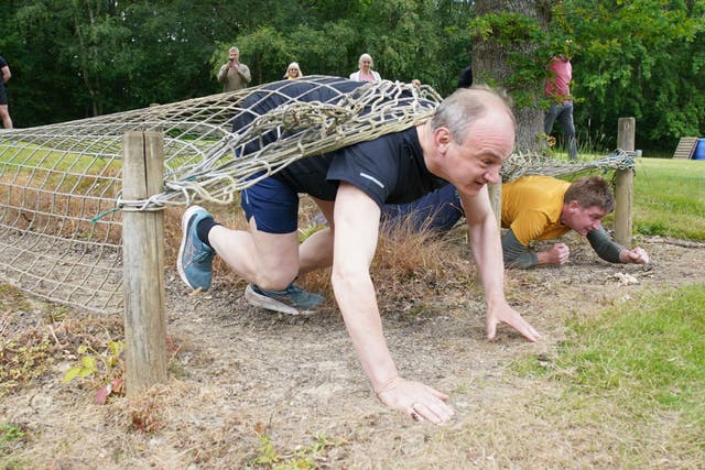 <p>Liberal Democrat leader Sir Ed Davey tried his hand at an assault course in Kent while on the campaign trail on Thursday (Gareth Fuller/PA)</p>
