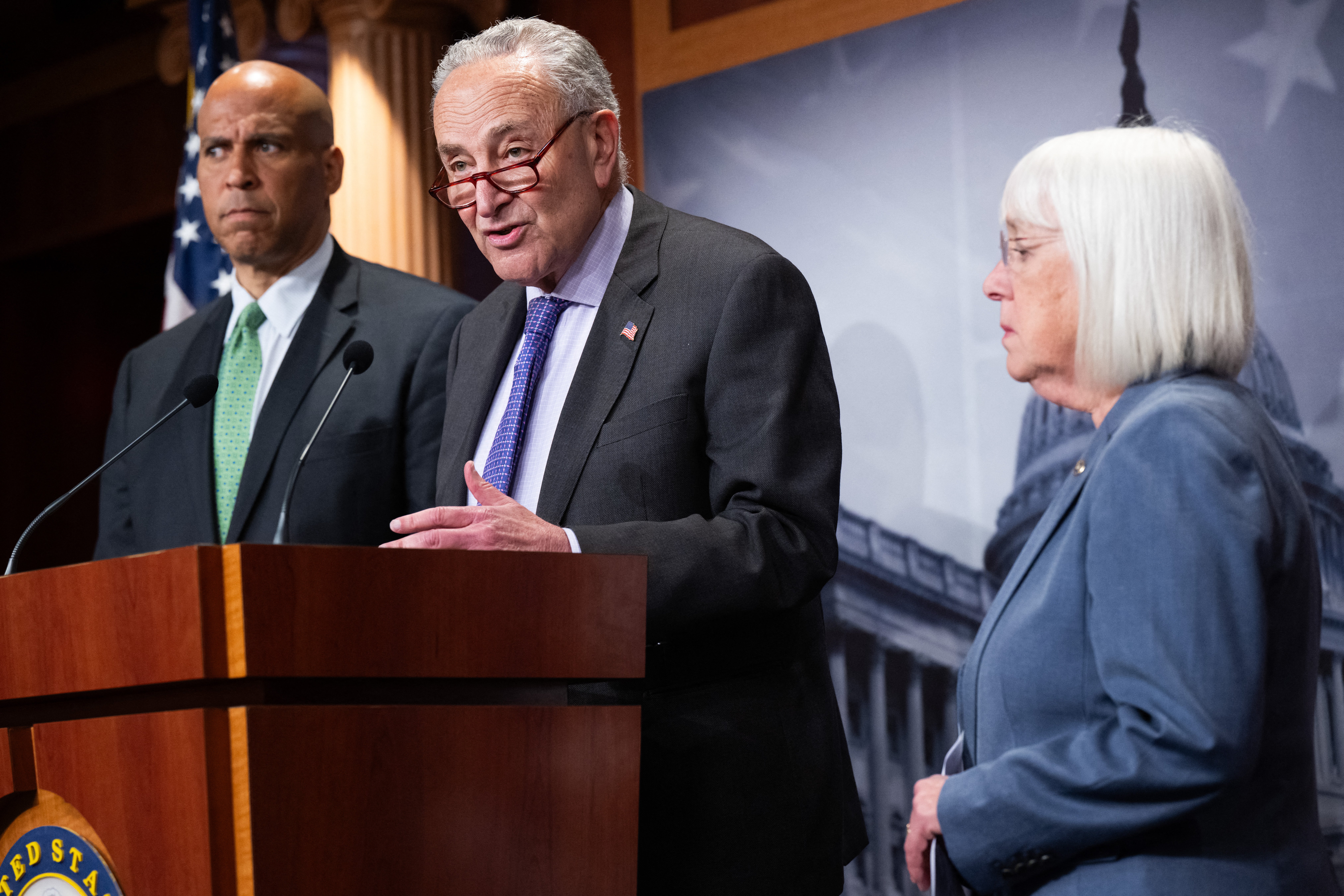 Cory Booker (left), Chuck Schumer (center) and Patty Murray (right) speak to reporters after Senate Republicans blocked IVF protections