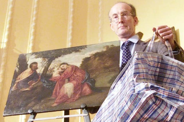 <p>Tim Moore, general manager of Lord Bath’s Longleat Estate, with the recovered Titian painting, which is now being put up for auction </p>