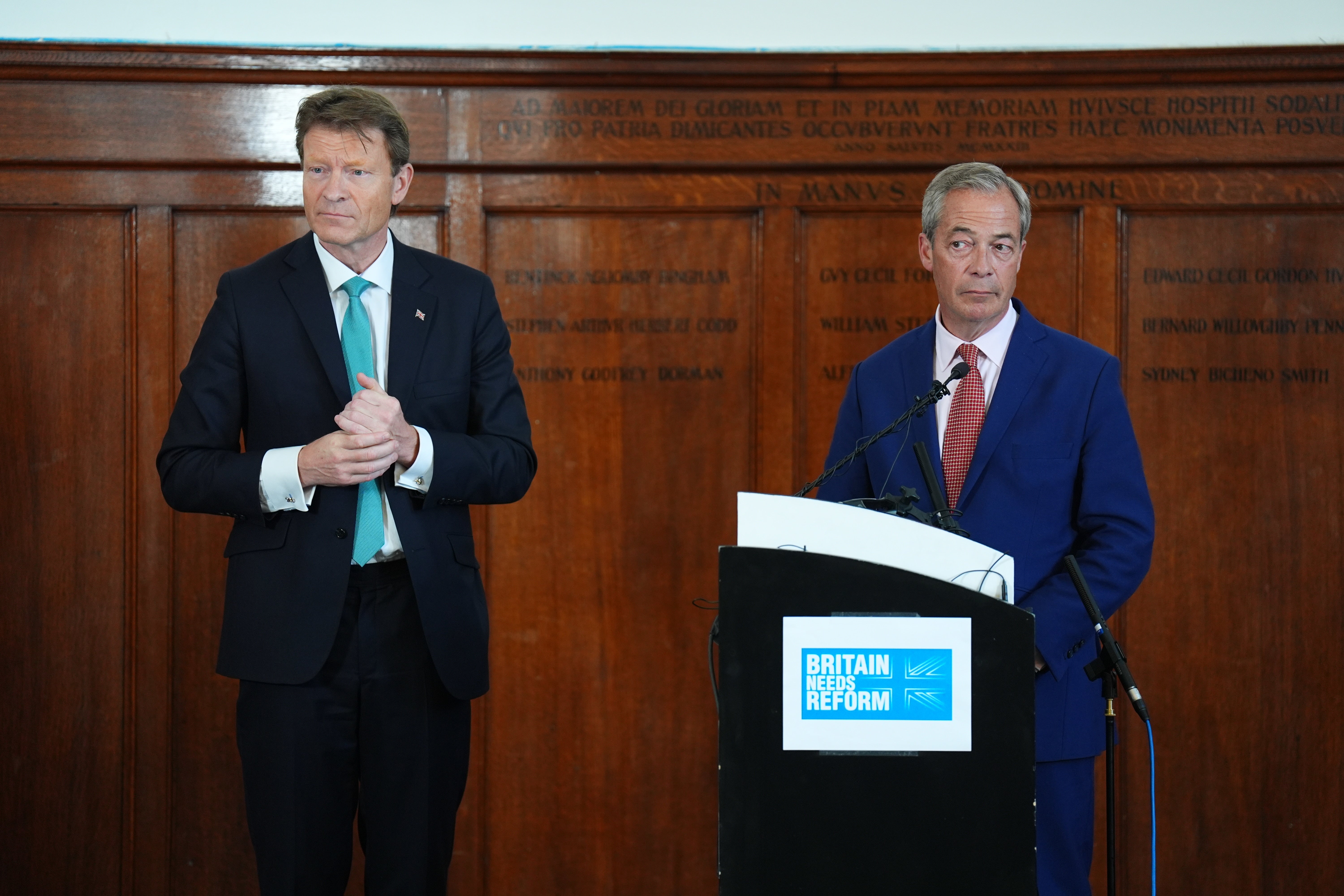 Reform UK leader Nigel Farage speaks to the media during a press conference at The Wellington, central London, while on the General Election campaign trail