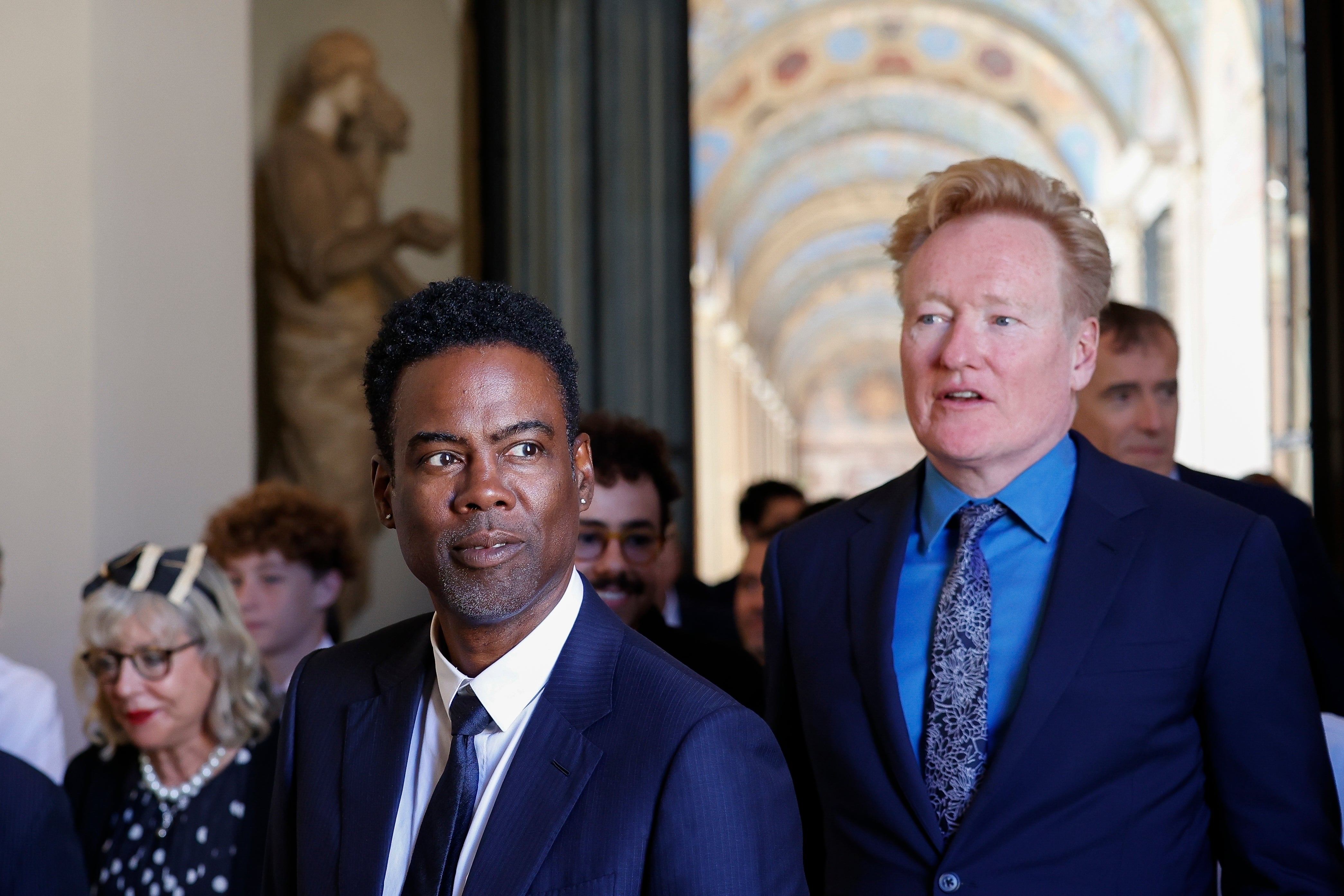Chris Rock, left, and Conan O’Brien arrive for an audience with Pope Francis in the Clementine Hall at The Vatican