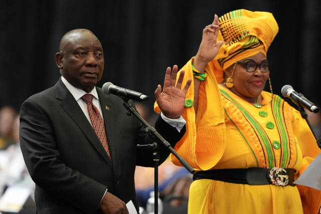 <p>South African President Cyril Ramaphosa and Pemmy Majodina of the African National Congress (ANC) at the first sitting of the country’s National Assembly since a May election</p>