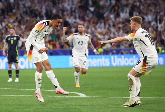 <p>Jamal Musiala, left, celebrates after scoring Germany’s second goal</p>