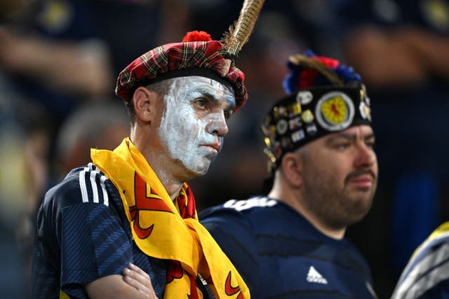 <p>A Scotland fan looks on during the 5-1 defeat to Germany  </p>