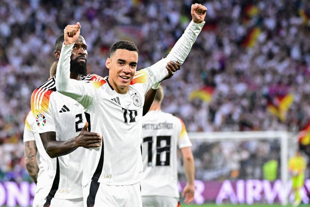 <p>Jamal Musiala celebrates after scoring Germany’s second goal</p>
