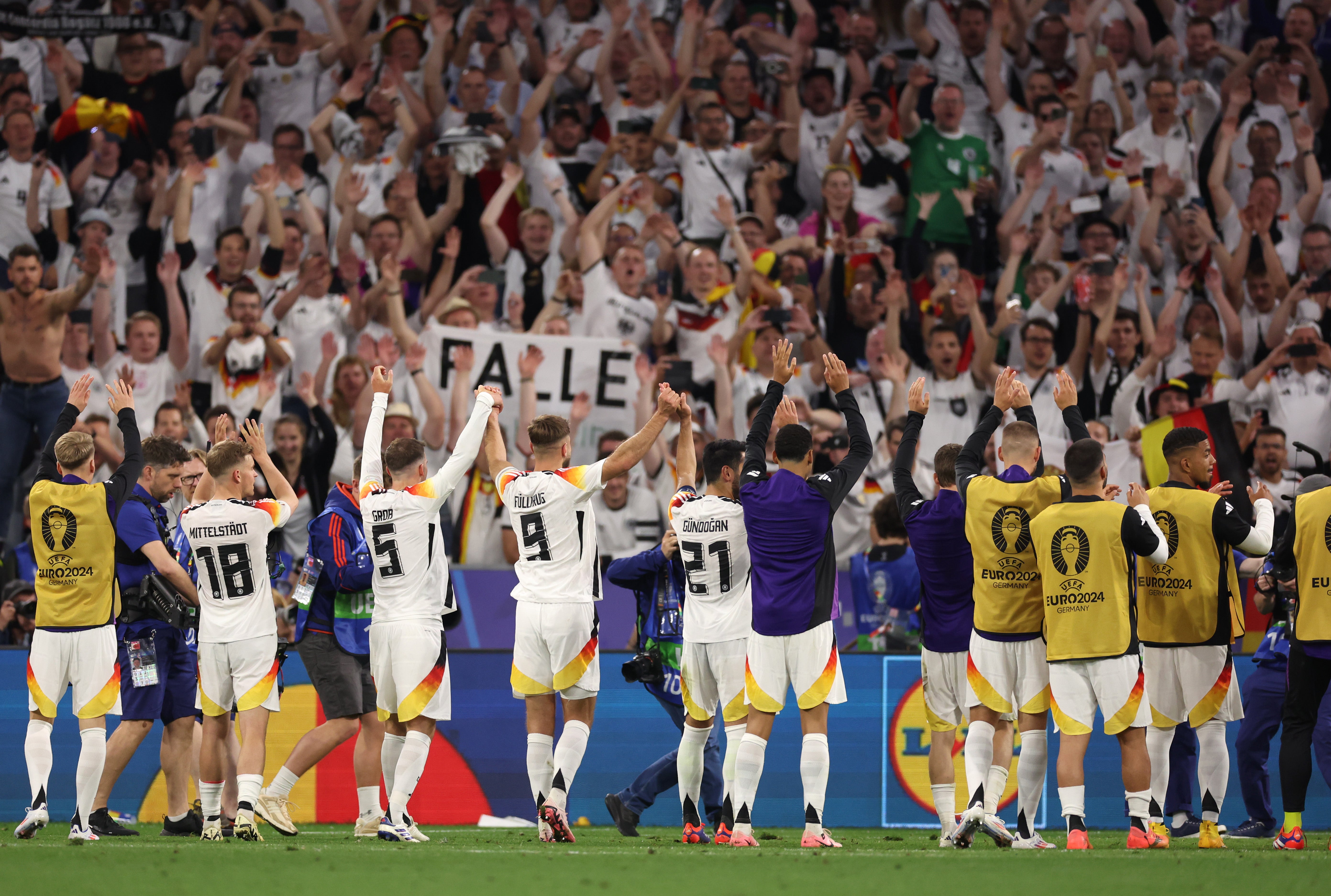 Germany players celebrate with their fans