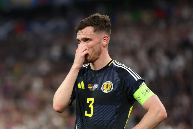 <p>Scotland captain Andy Robertson and his team endured a brutal loss to Germany</p>