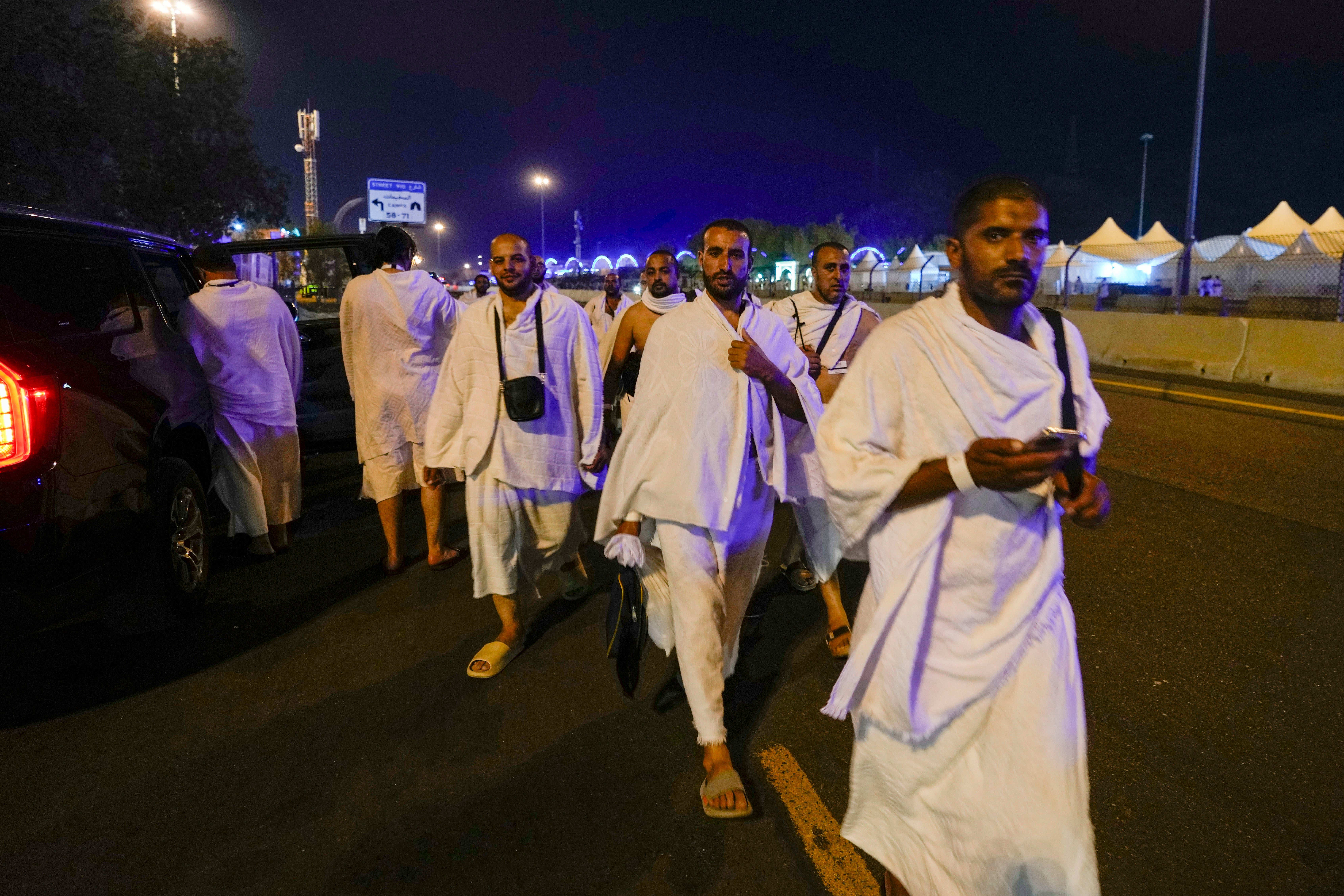 Muslim pilgrims arrive at at the Plain of Arafat during the annual Hajj pilgrimage, near the holy city of Mecca, Saudi Arabia, Friday, 14 June 2024
