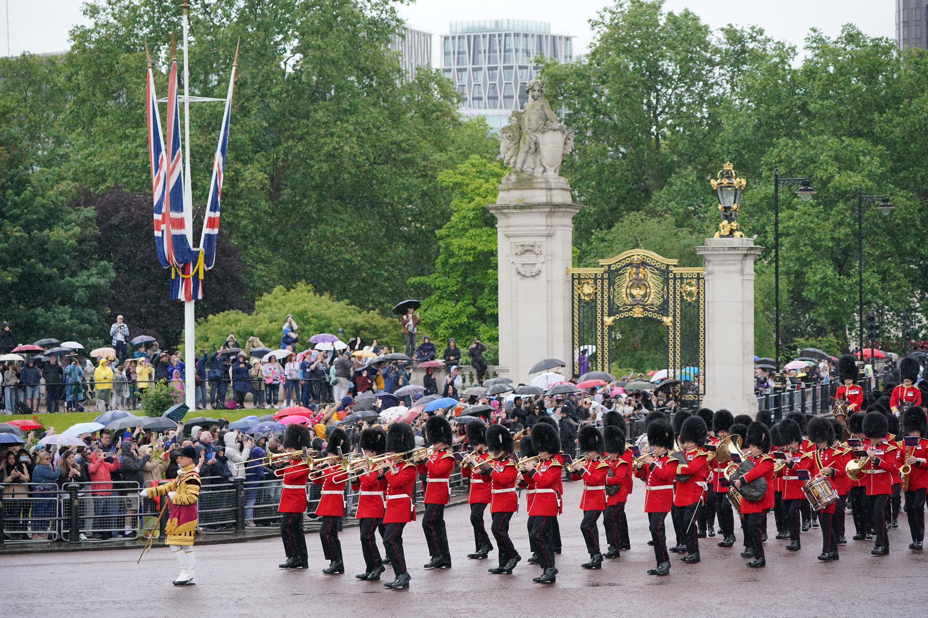 The Grenadier Guards Band marches along The Mall towards the Horse Guards Parade