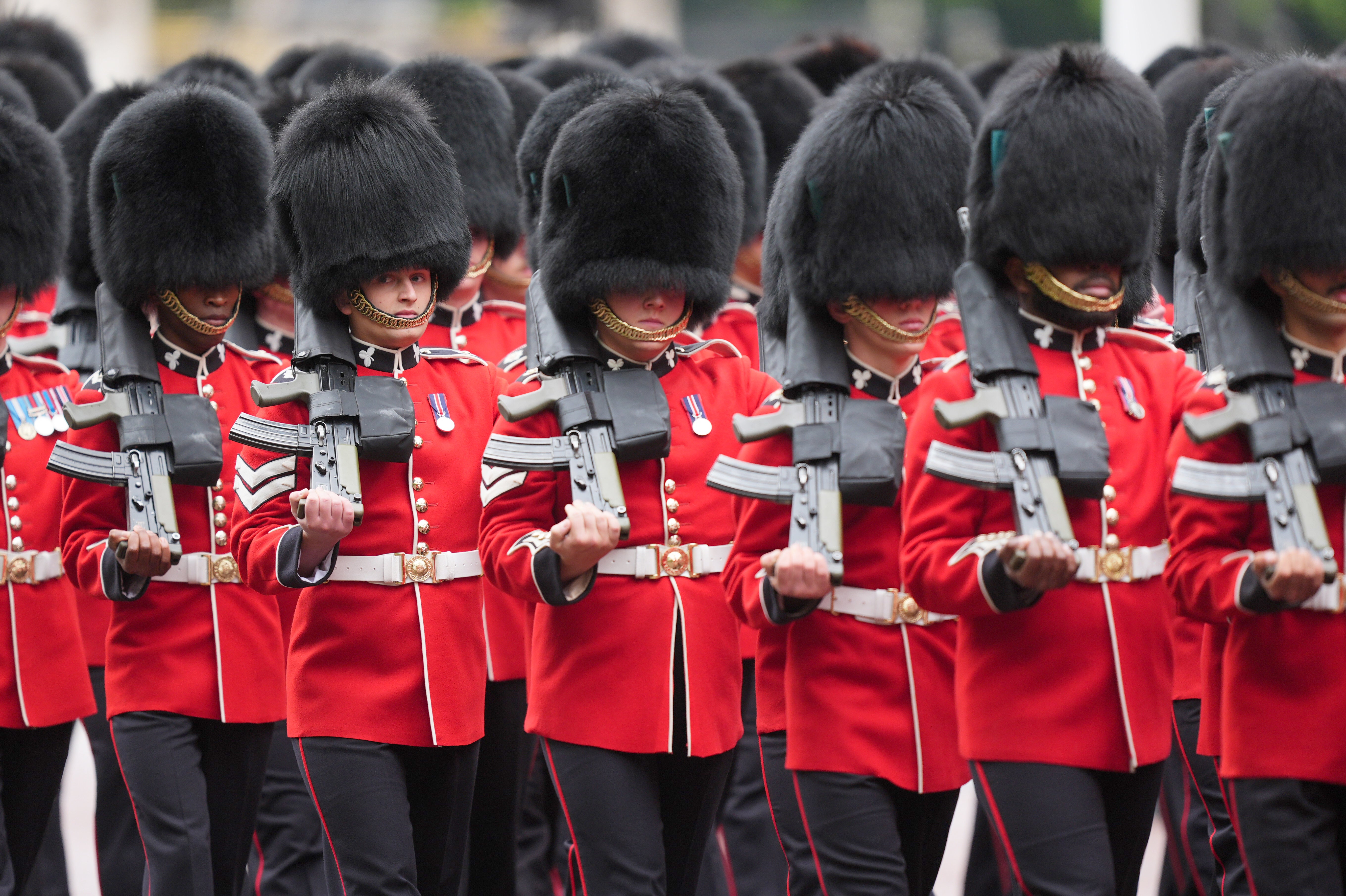 Members of the Irish Guards take part in the procession.
