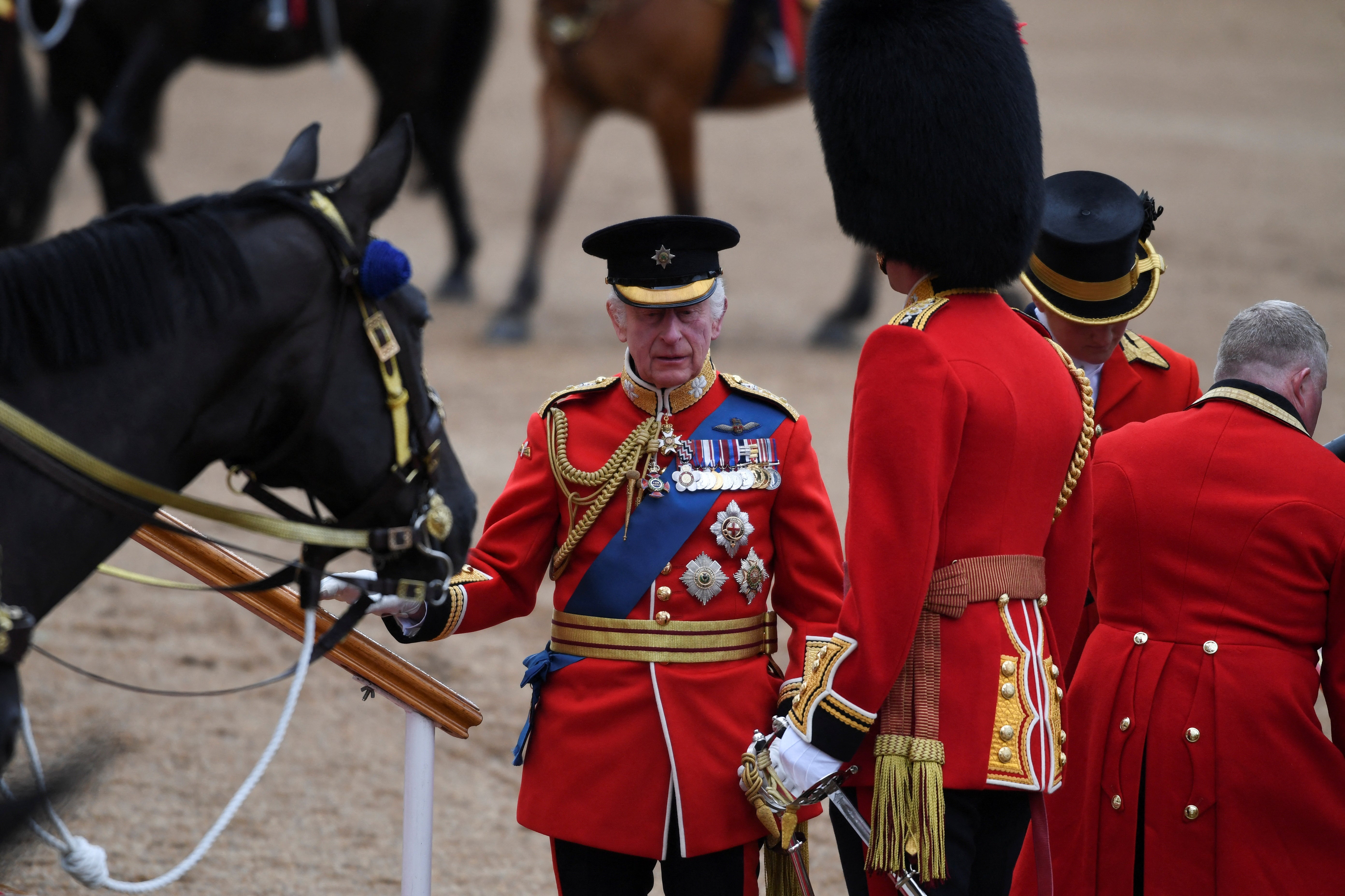 Britain's King Charles arrives for the Trooping the Colour which honours his official birthday