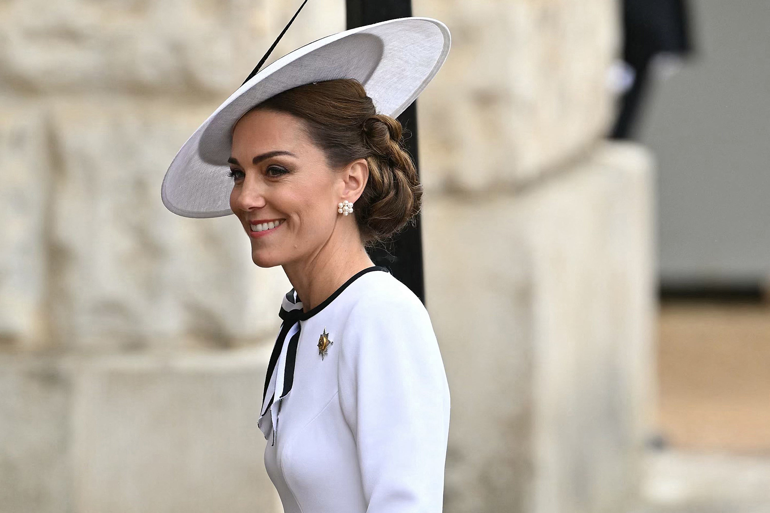 Kate beamed as she took part in the parade