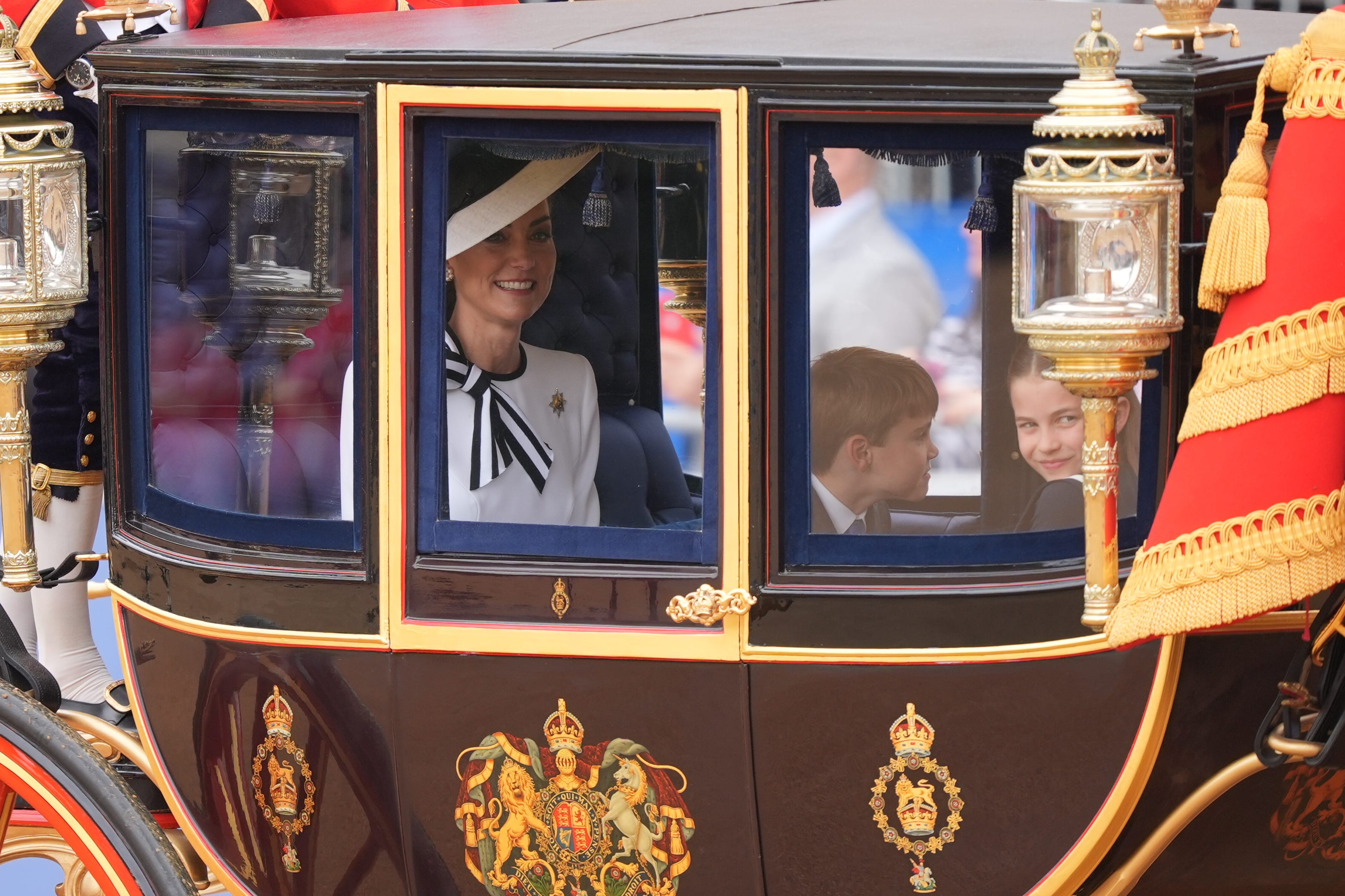 The Princess of Wales, Prince Louis and Princess Charlotte arrive for the Trooping the Colour ceremony (Yui Mok/PA)