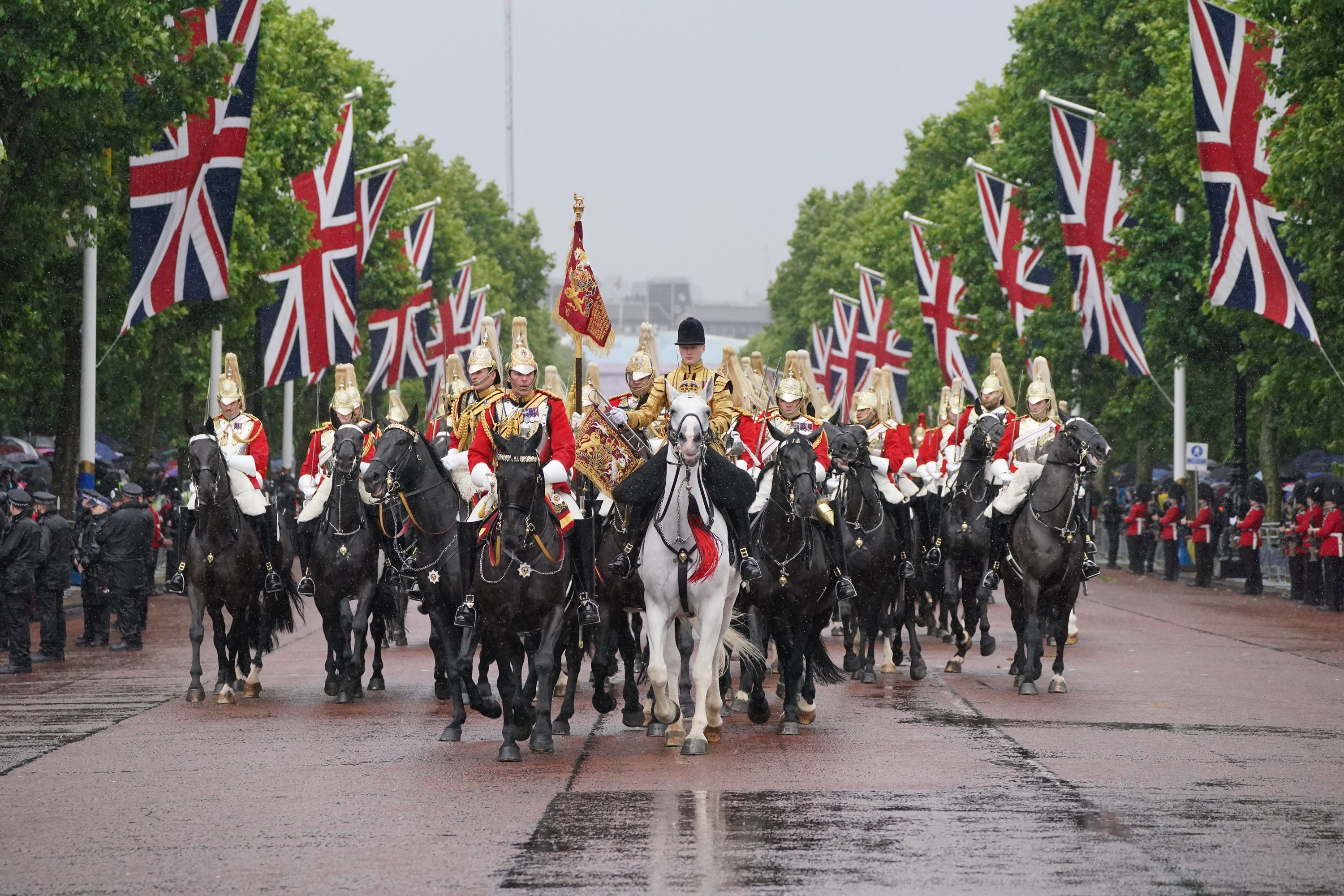 Thundery showers and rain impacted the Trooping the Colour