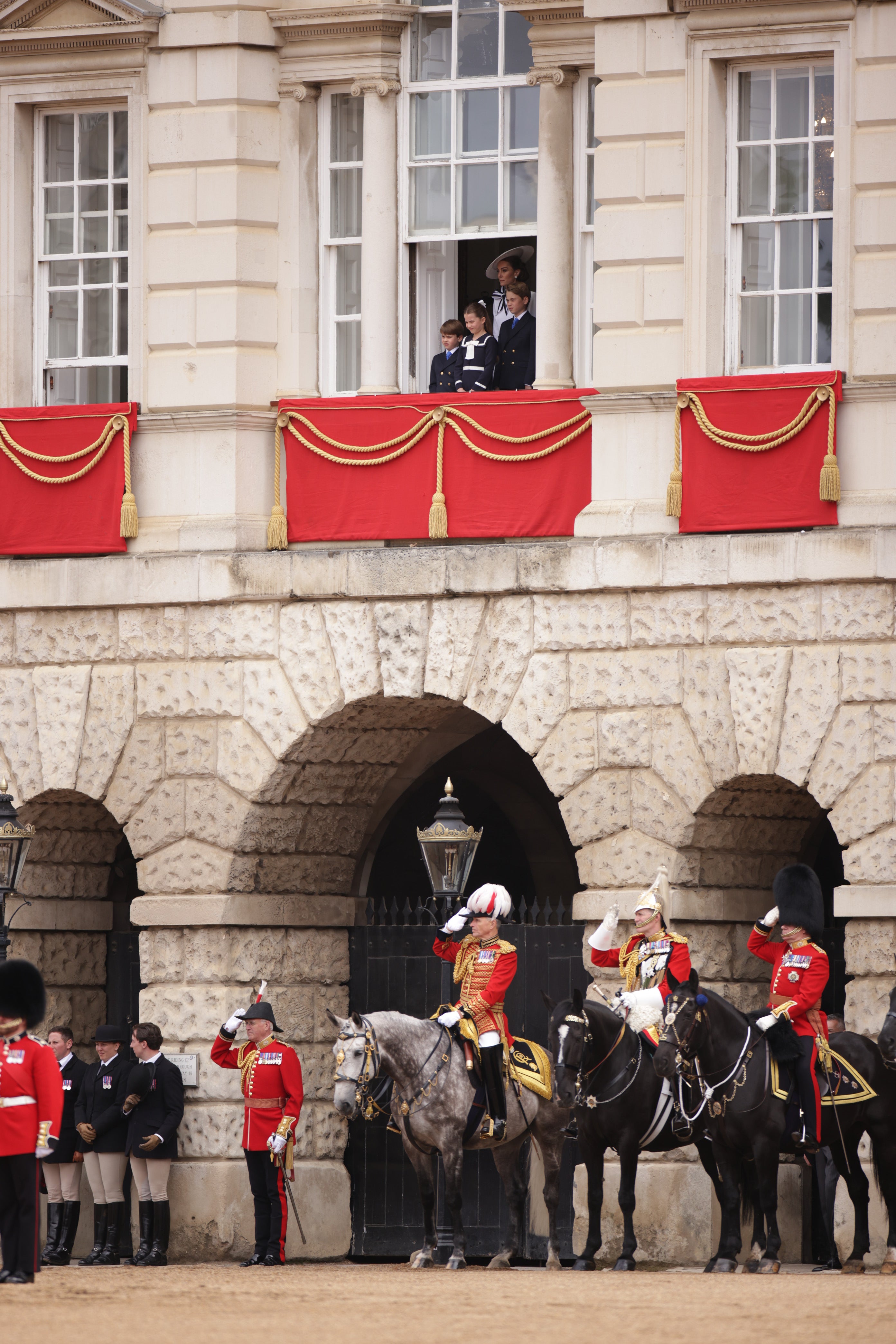 The Princess of Wales watches the parade from a balcony