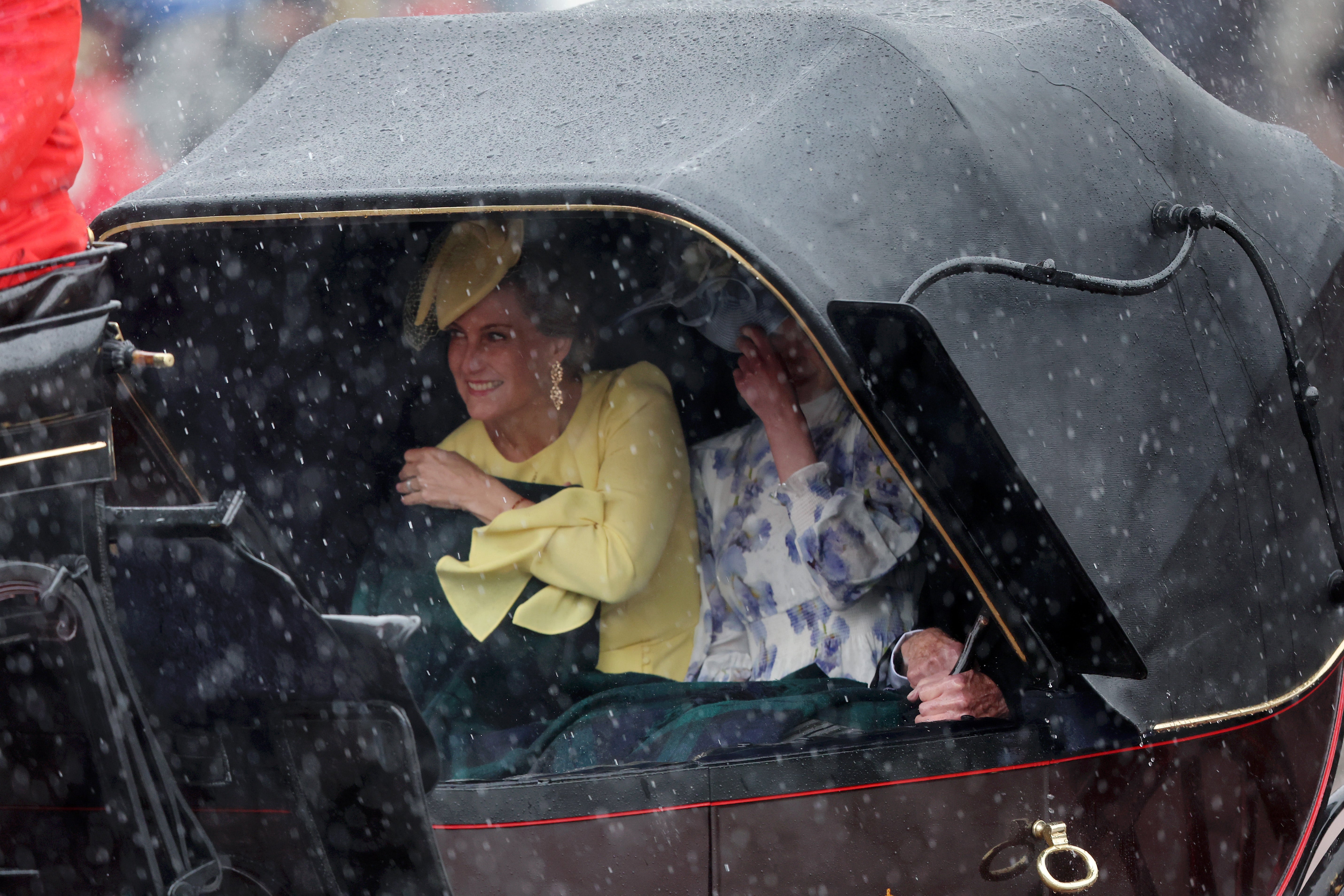 Sophie, Duchess of Edinburgh, looks out at the rain