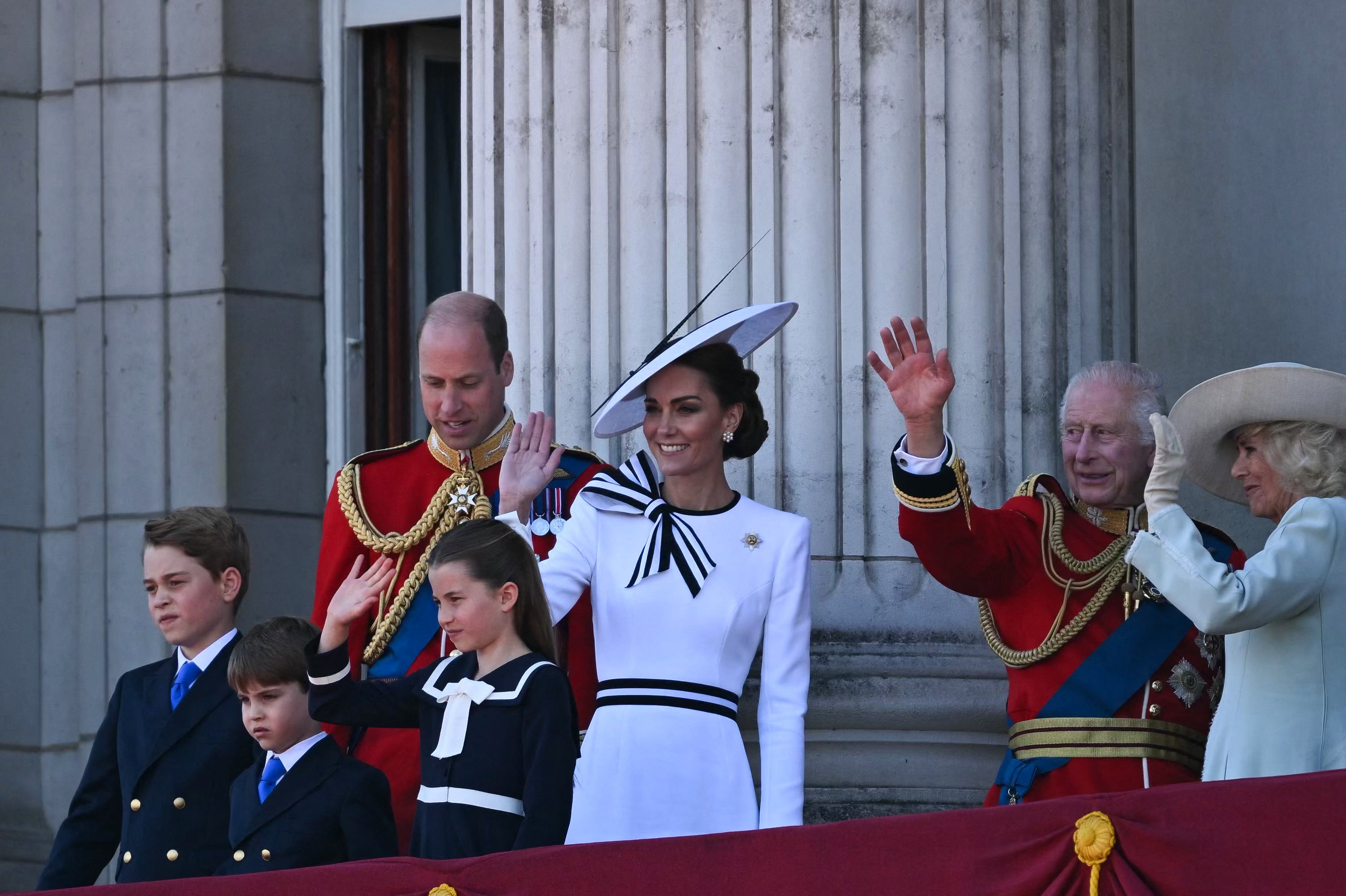 The royal family appear united together on the balcony at the finale of the Trooping the Colour