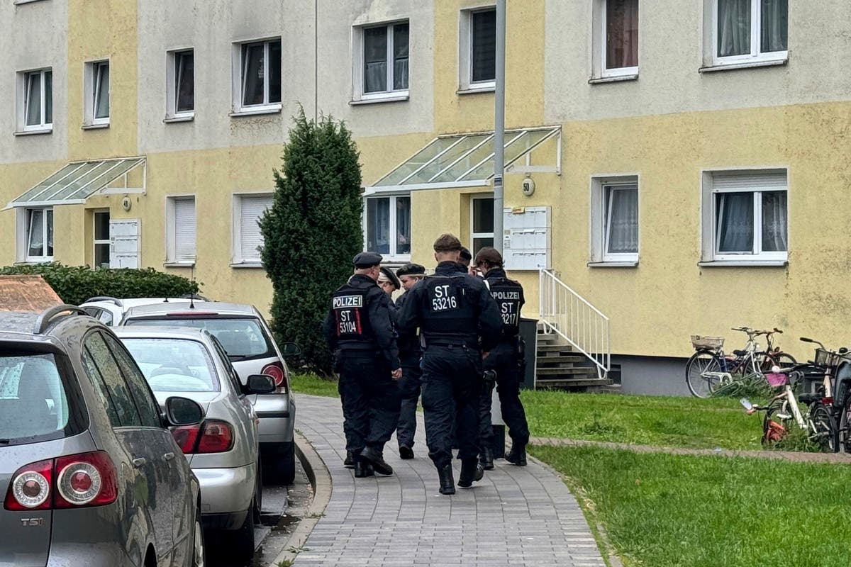 German police shoot to death an Afghan man who killed a compatriot, then attacked soccer fans German police shoot to death an Afghan man who killed a compatriot, then attacked soccer fans