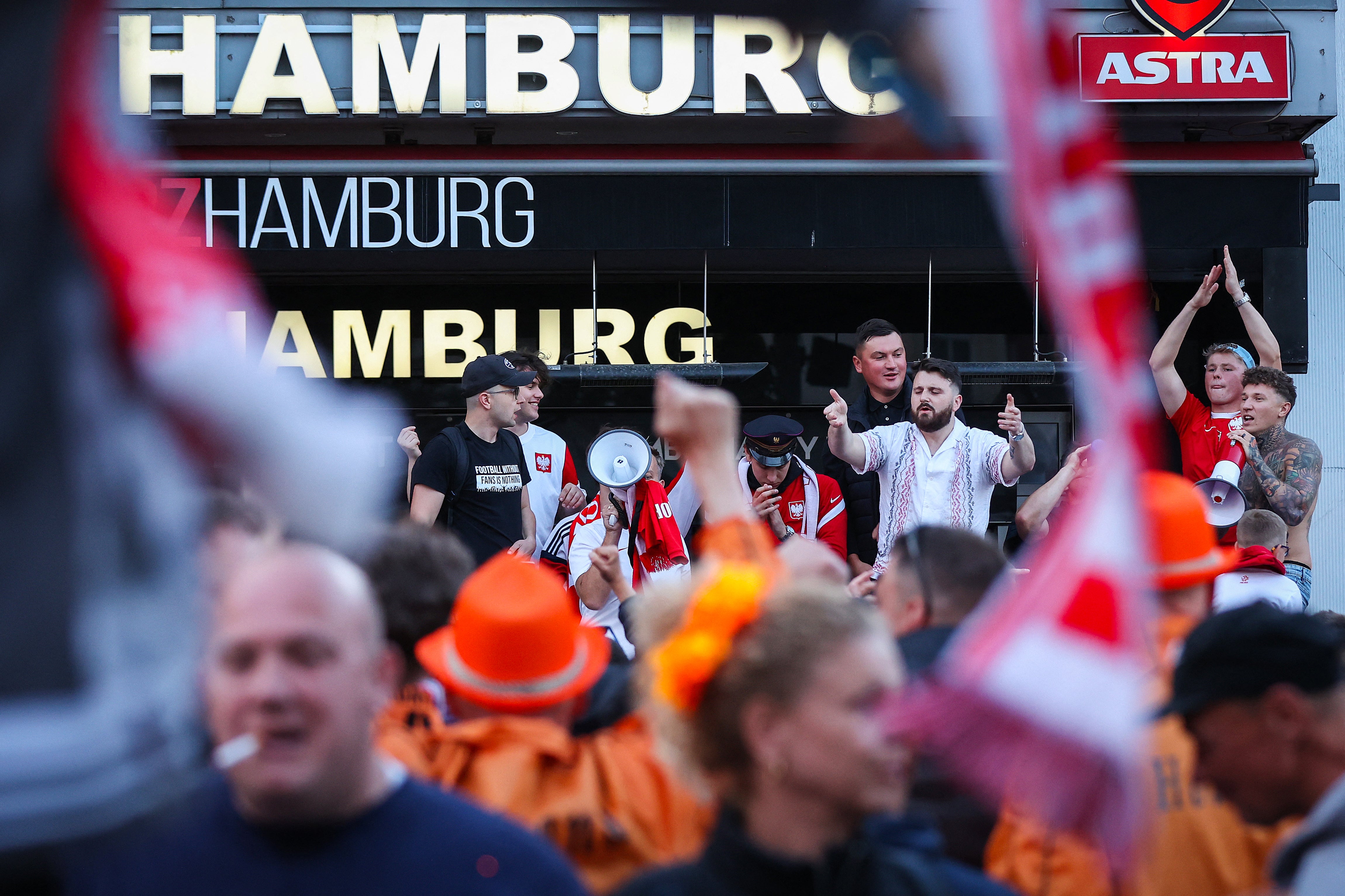Thousands of Dutch and Polish fans have descended on Hamburg ahead of their 2pm game