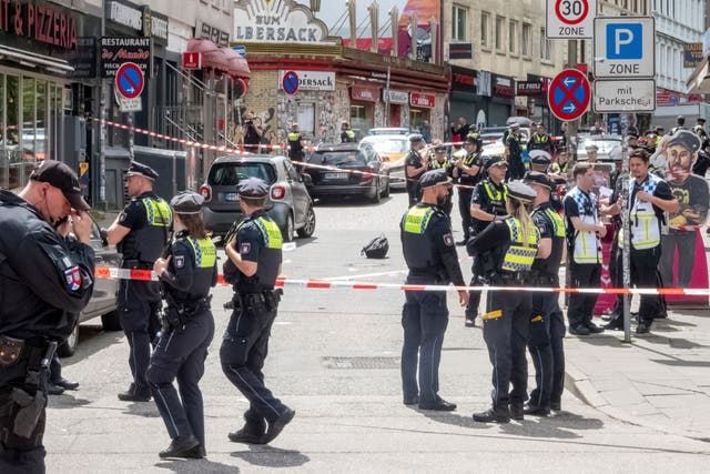 Police cordon off an area near the Reeperbahn in Hamburg (Bodo Marks/AP)
