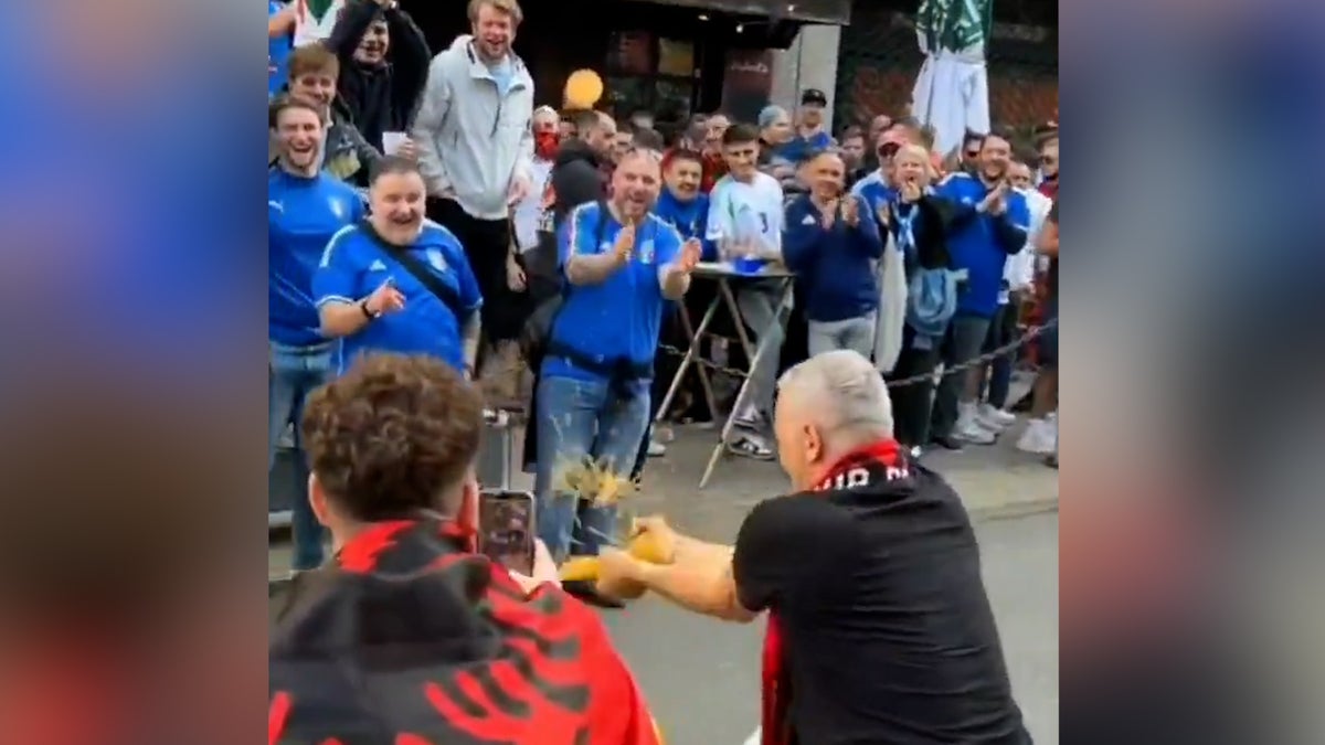 Albanian fans cheekily snap spaghetti in front of Italians at Euros