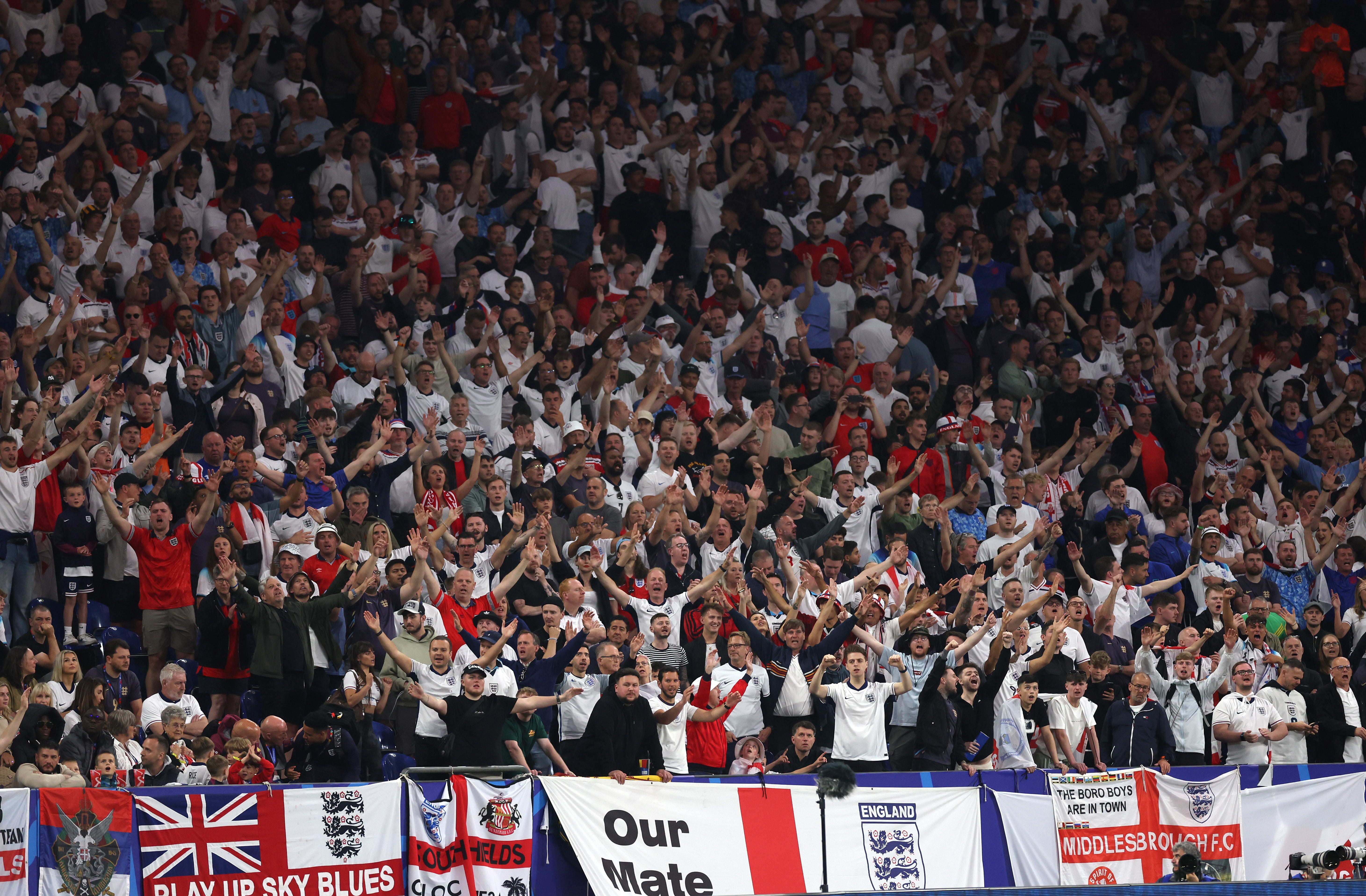 England fans show their support as their team take on Serbia