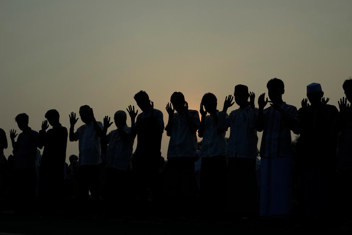 Muslims in Asia celebrate Eid al-Adha with sacrifice festival and traditional feast