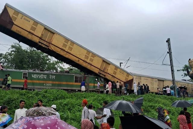 <p>Preliminary photos and videos of the collision showed a pile-up of train compartments in Phansidewa district with one nearly vertical in the air</p>