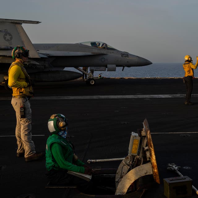 <p>Mideast Tensions Fighter jets maneuver during take-off operations on the deck of the USS Dwight D. Eisenhower in the Red Sea on Tuesday</p>
