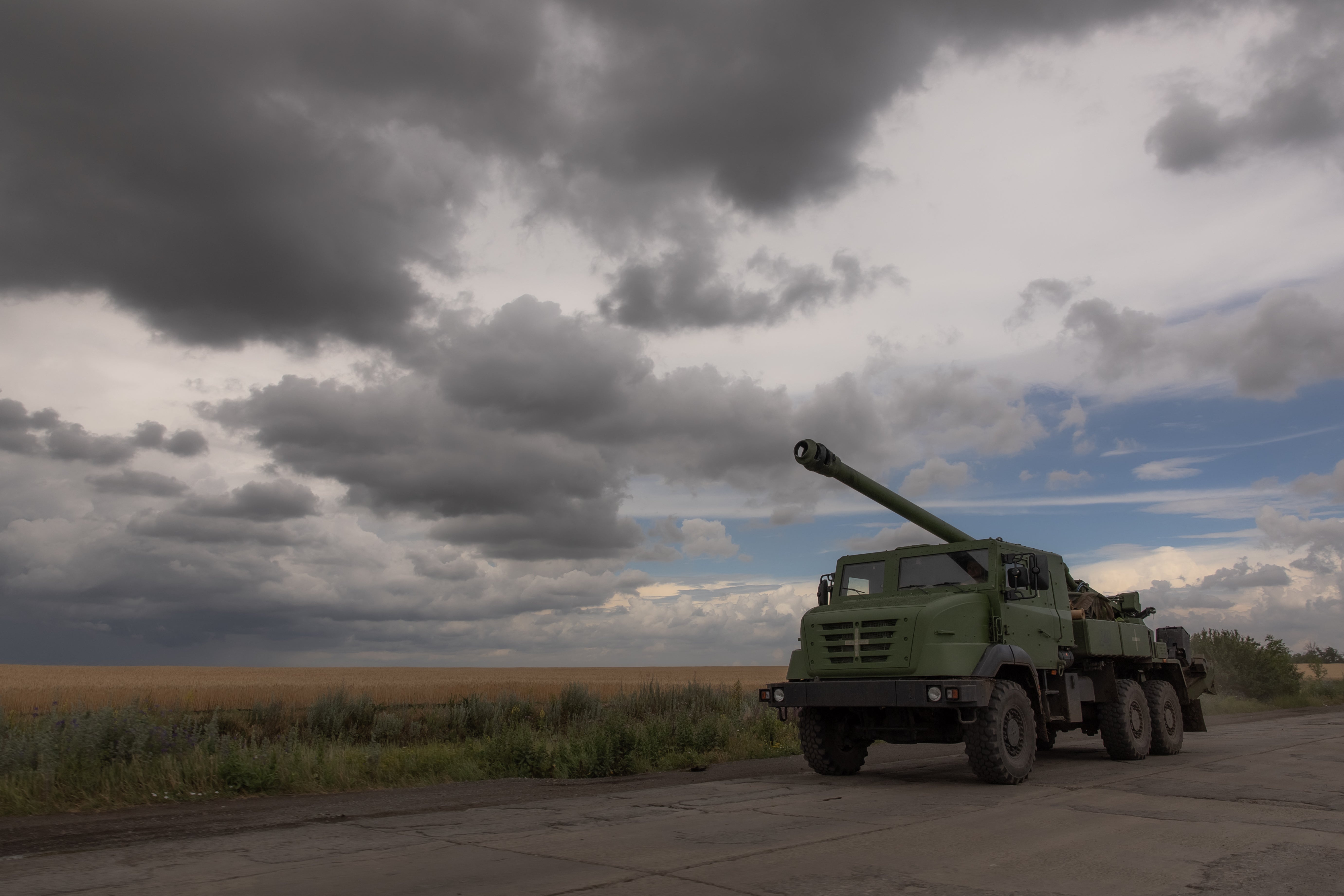 A French-made Caesar howitzer is pictured running on a road in the Donetsk region