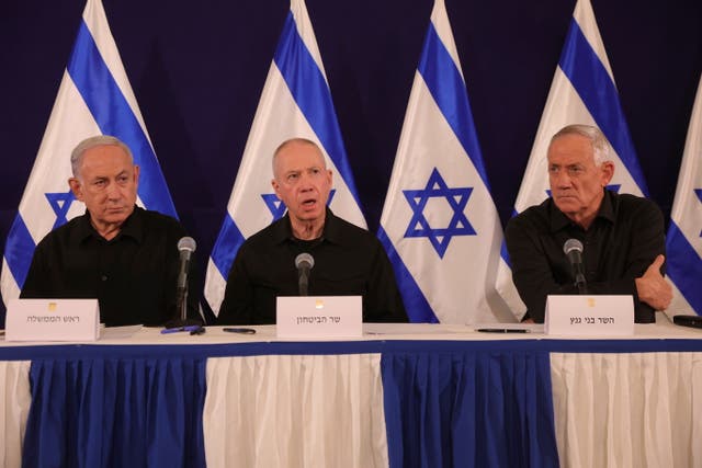 <p>The Israeli war cabinet’s three active members since the 7 October attack were (from left) prime minister Benjamin Netanyahu, defence minister Yoav Gallant and cabinet minister Benny Gantz </p>