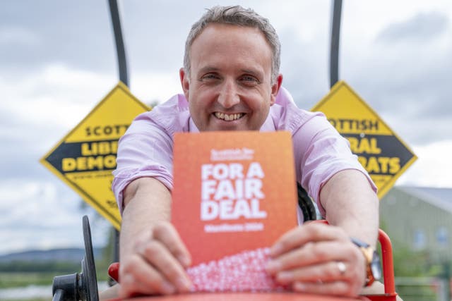 Scottish Liberal Democrat leader Alex Cole-Hamilton during a visit to Craigie’s Farm in South Queensferry to launch the party’s General Election manifesto (Jane Barlow/PA)