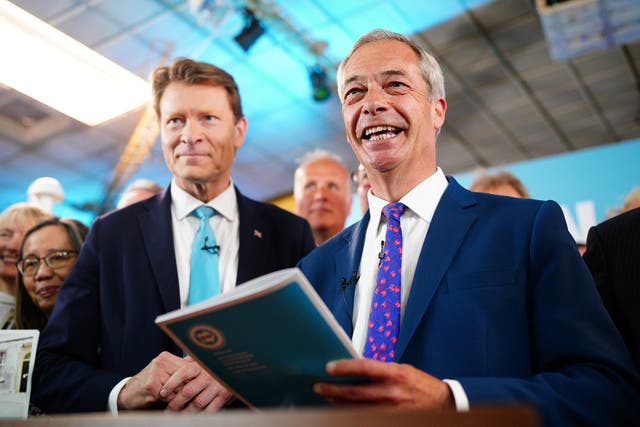 <p>Reform UK chairman Richard Tice (left) and party leader Nigel Farage launch ‘Our Contract with You’ in Merthyr Tydfil on Monday </p>
