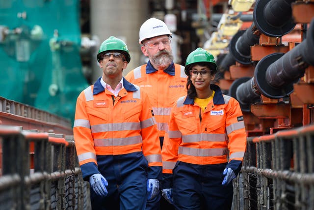 Prime Minister Rishi Sunak (left) and Energy Security and Net Zero Secretary Claire Coutinho are given a tour of the Rough 47/3B Bravo gas platform by the chief executive of Centrica Chris O’Shea (Leon Neal/PA)