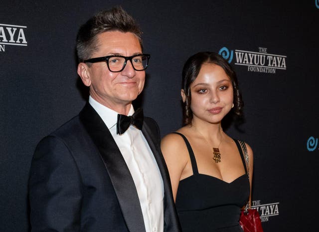 <p>Andre Agapov and Aurora Agapov arrive on the red carpet for the WWD Honors at Cipriani South Street in New York October 16, 2023</p>