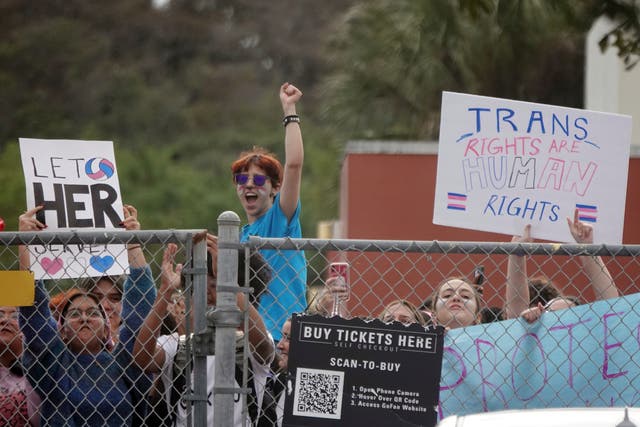 <p>Students from Monarch High School in Coconut Creek, Florida, stage a walk out in protest of policies targeting transgender students. Federal judges this month have sided with Republican attorneys general suing the Biden administration over protections for LGBT+ students. </p>
