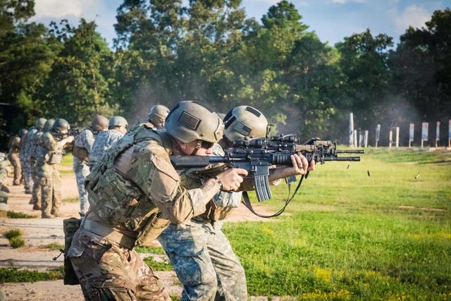 <p>A US Army infantryman assigned to Foxtrot Company ‘Pathfinders’ 2nd Assault Helicopter Battalion, 82nd Combat Aviation Brigade, looks through his sights during M4 rifle reflexive fire range training at Fort Bragg, North Carolina </p>