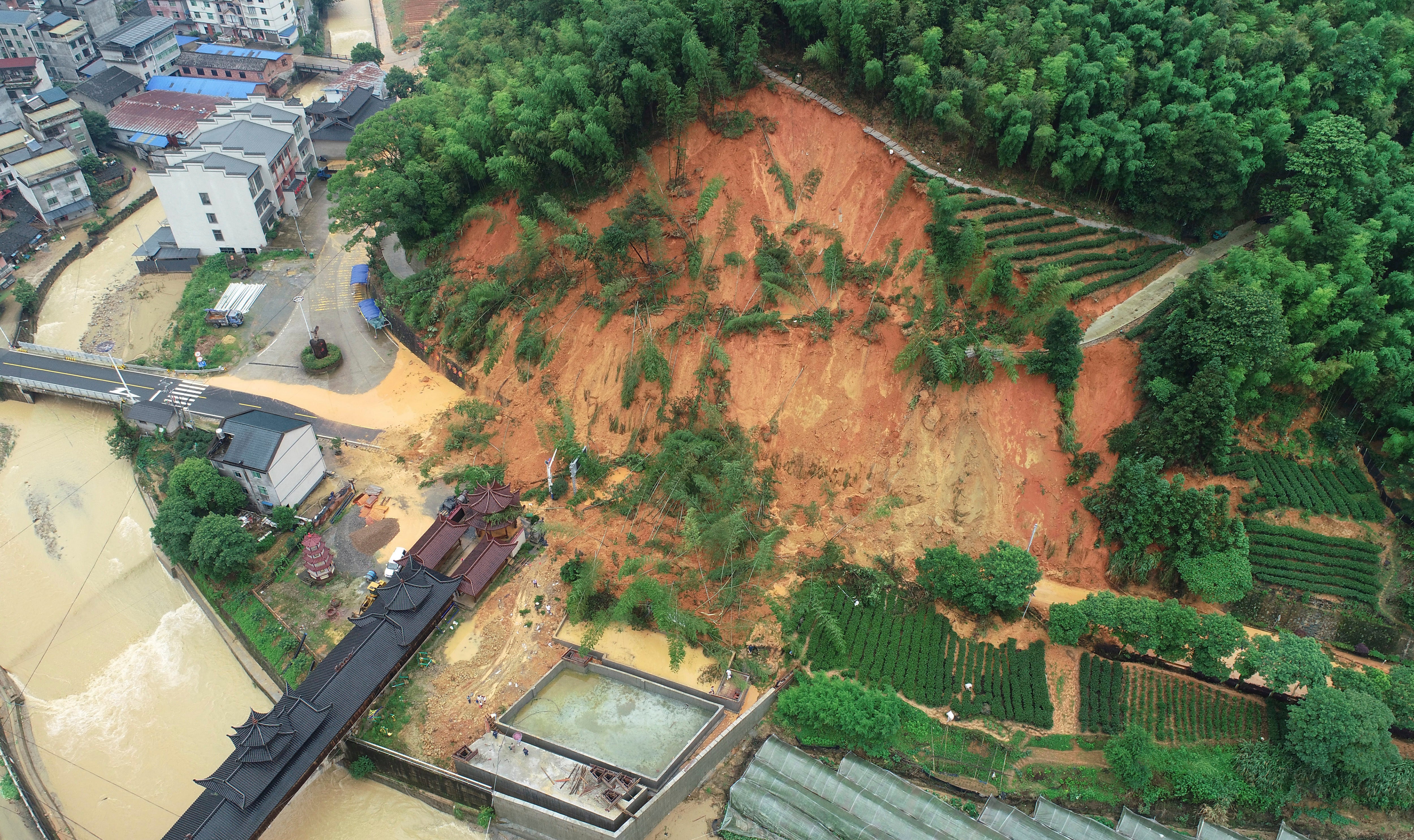Aerial drone image shows landslide in an area affected by torrential rains in Tieshan Township of Zhenghe County
