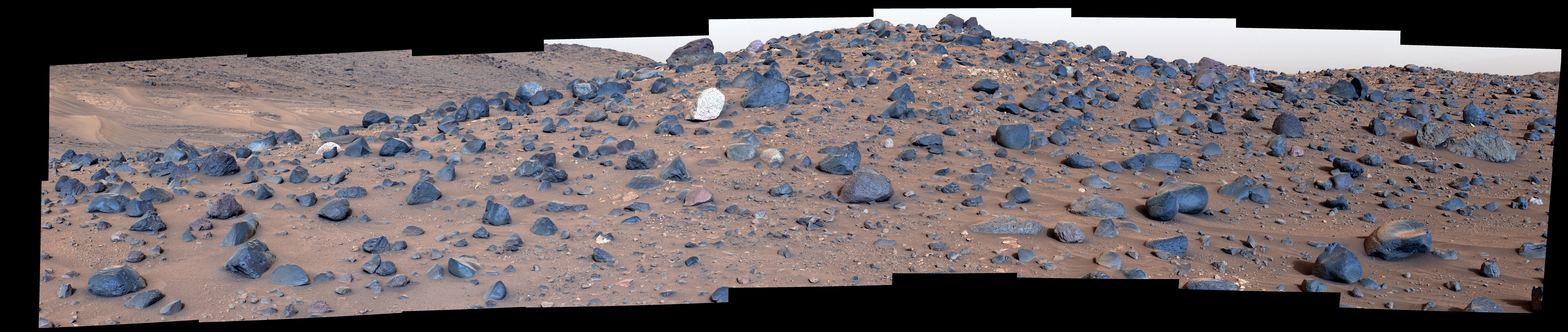 Stitched together from 18 images taken by NASA’蝉 Perseverance rover, this mosaic shows a boulder field on ‘Mount Washburn’ on May 27