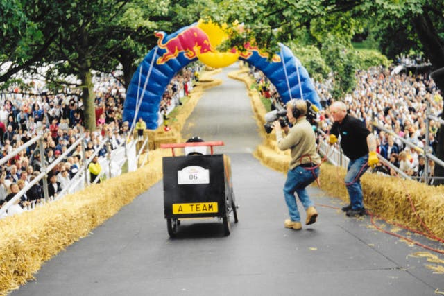 An action shot of the group’s A-Team Van at the Red Bull Soapbox Race at Roundhay Park, Leeds, in 2001 (Jonny Heath/PA)