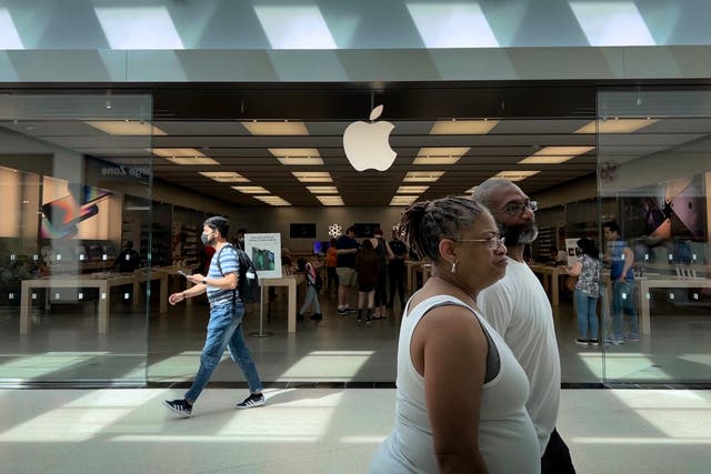 People walk past The Apple Store at the Towson Town Center mall, the first of the company’s retail locations in the U.S. where workers voted over the weekend to unionize, on June 20, 2022 in Towson, Maryland