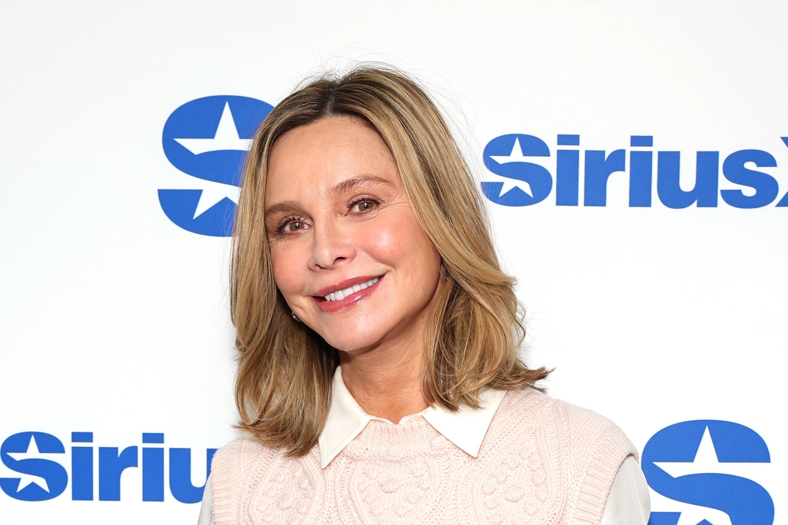 paparazzi, fame, harrison ford, calista flockhart says sudden ally mcbeal fame affected her mental health