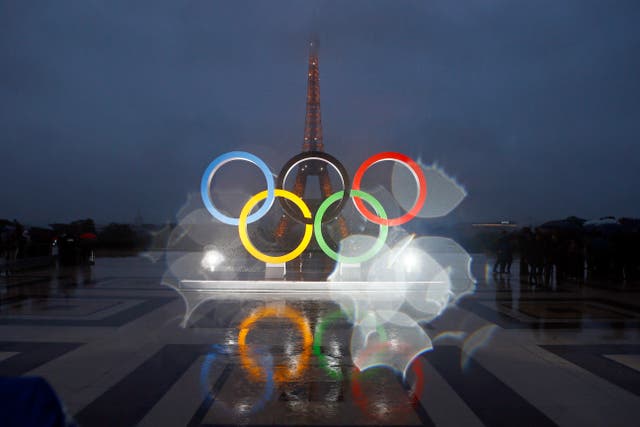 <p>Olympic rings on Trocadero plaza that overlooks the Eiffel Tower</p>