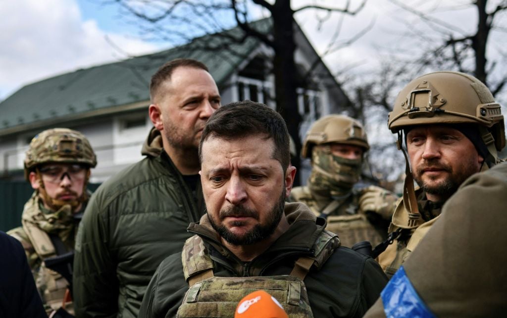 An otherwise stoic Ukrainian president Volodymyr Zelensky looks disturbed as he visits Bucha for the first time after it was liberated from Russian occupation in April 2022