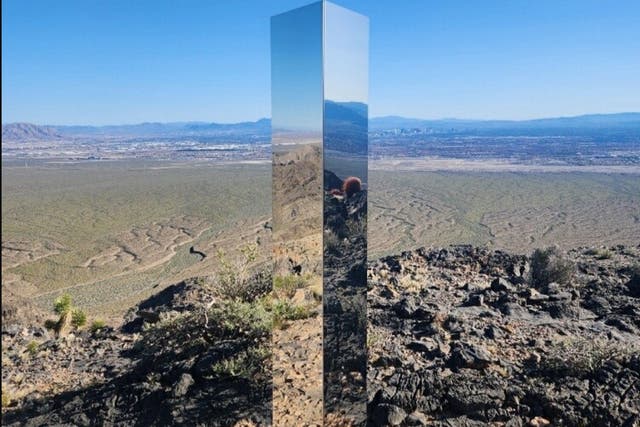<p>A reflective monolith, similar to those found in Utah, California, Romania, and New Mexico, has appeared outside of Las Vegas</p>