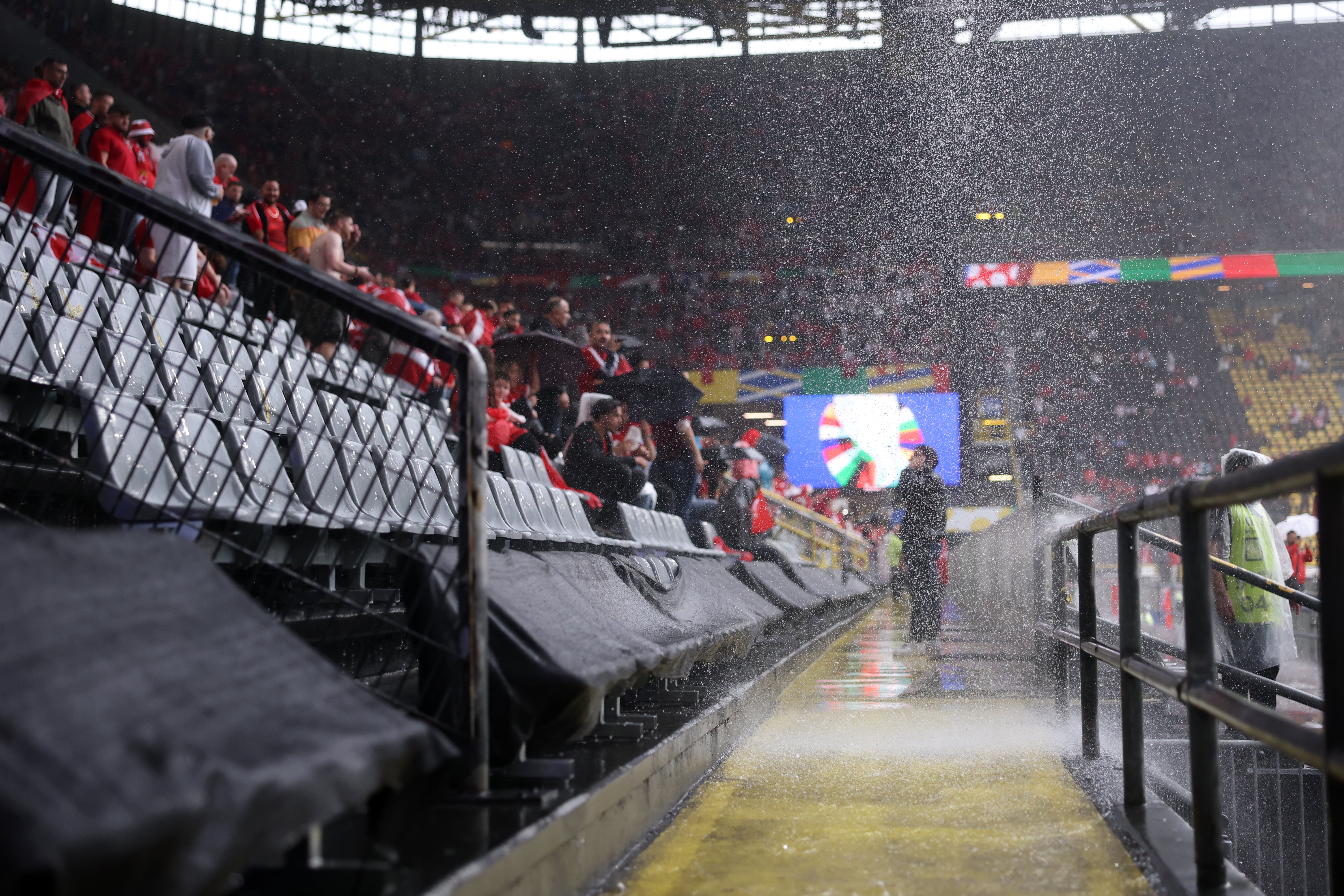 Storms in Dortmund caused rain to pour through the roof of the BVB Stadion