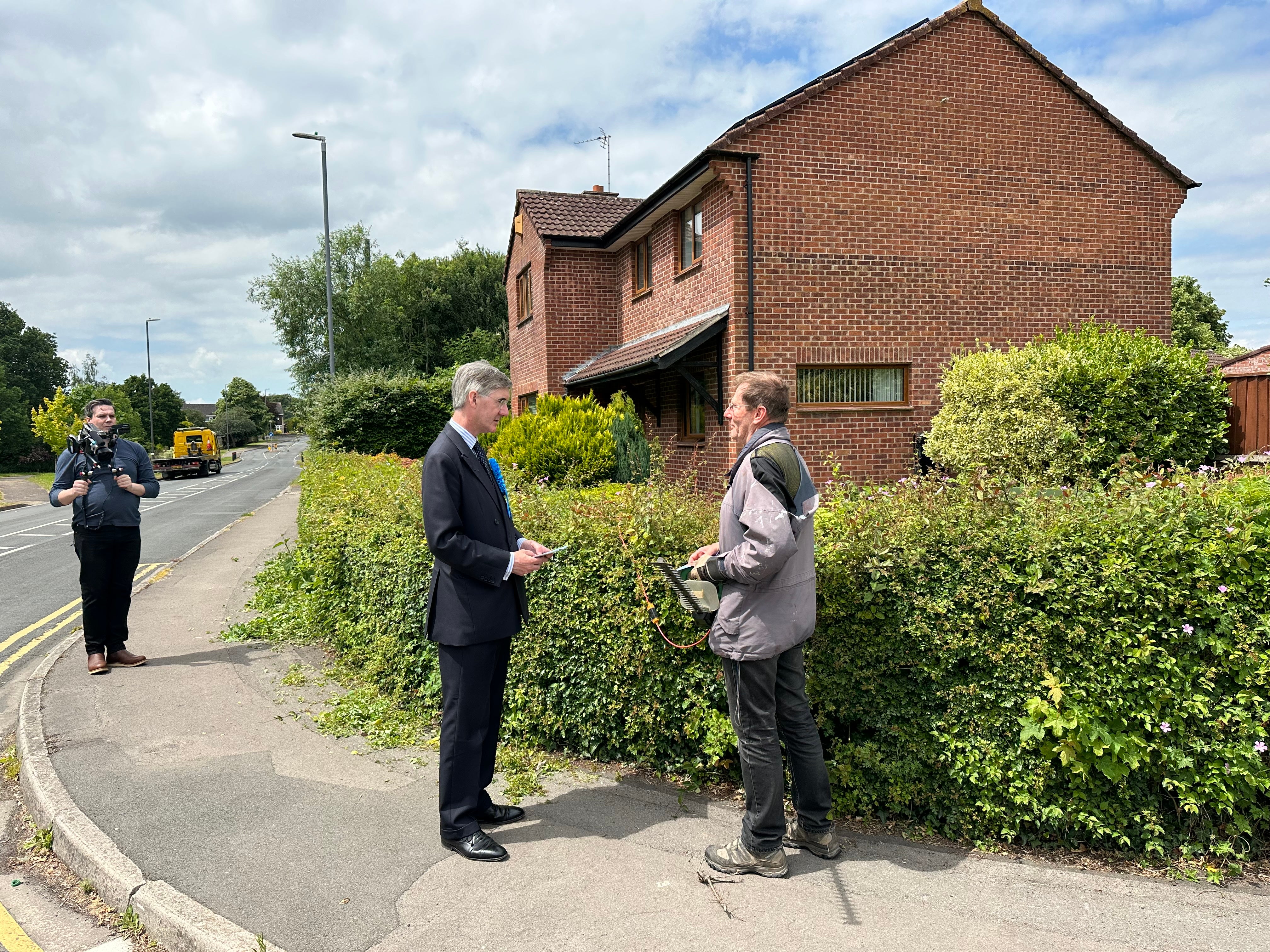 Mark Bray tells Sir Jacob Rees-Mogg he’s undecided on who to vote for. Asked what the big issues are locally, he points toward a 5G mast near his home