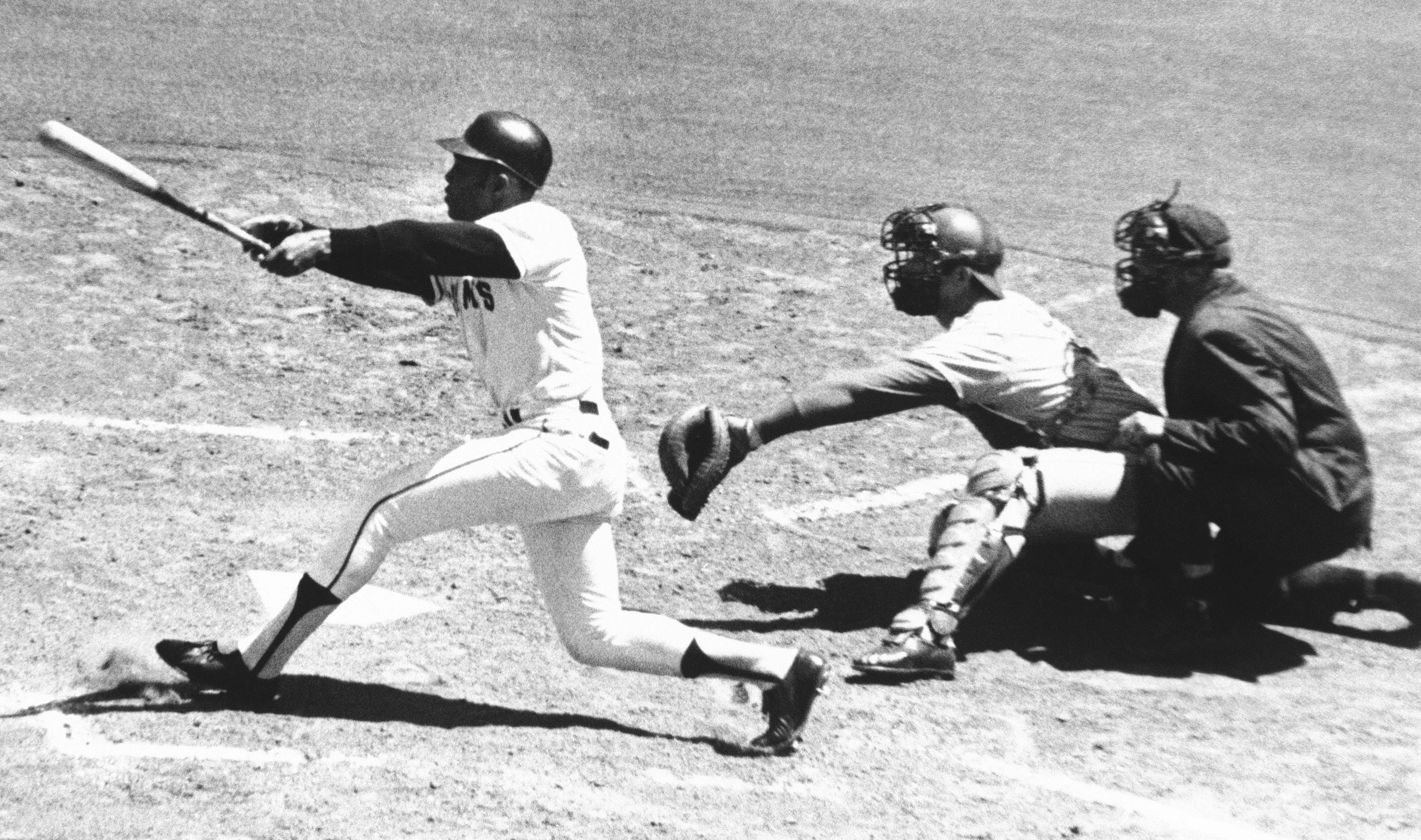 San Francisco Giants' Willie Mays watches the 3,000th hit of his career, a single to left, in the second inning against the Montreal Expos at Candlestick Park in San Francisco on July 18, 1970